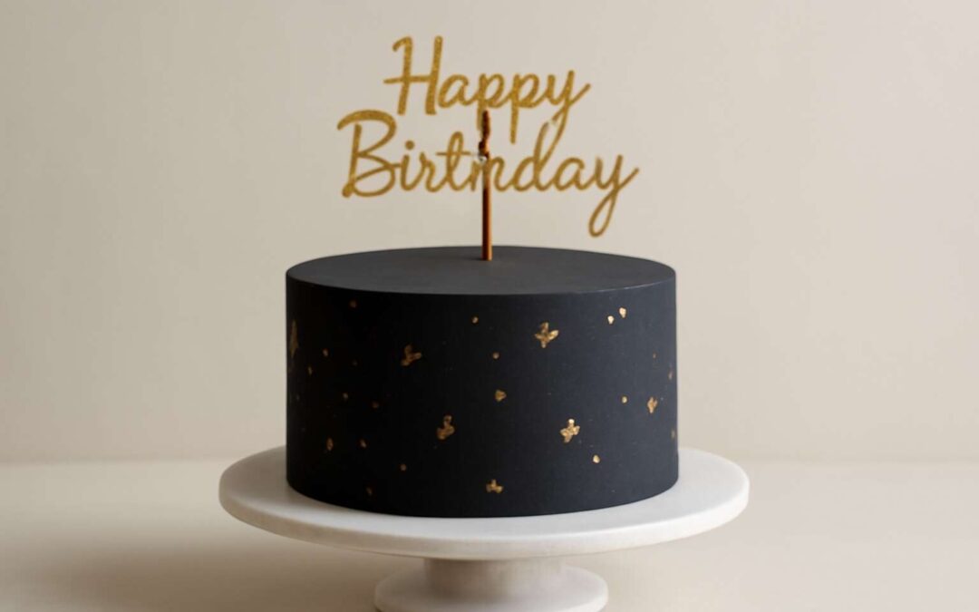 Glam up celebrations with a stunning simple black and gold birthday cake!