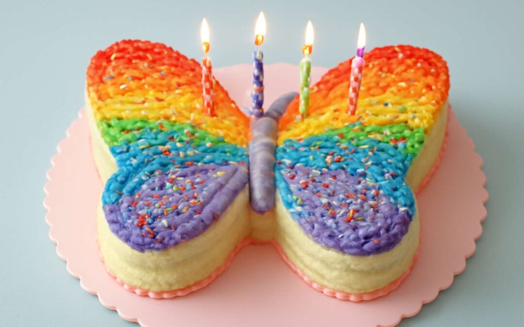 Enchanting birthday cake butterfly moment lights up your party.
